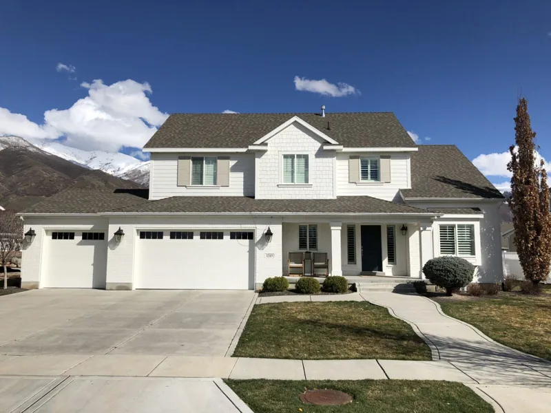 A completed home exterior with carefully aligned siding and trim